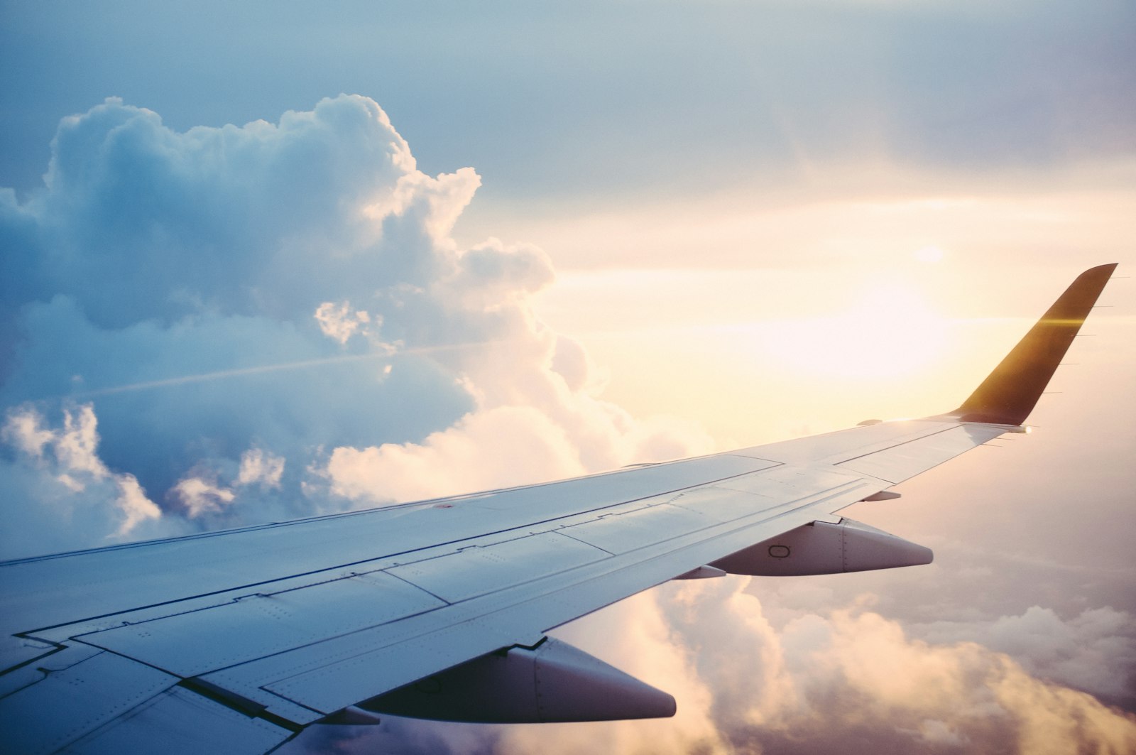 iv therapy for jet lag recovery after long-haul international flights — traveler resting after overnight flight